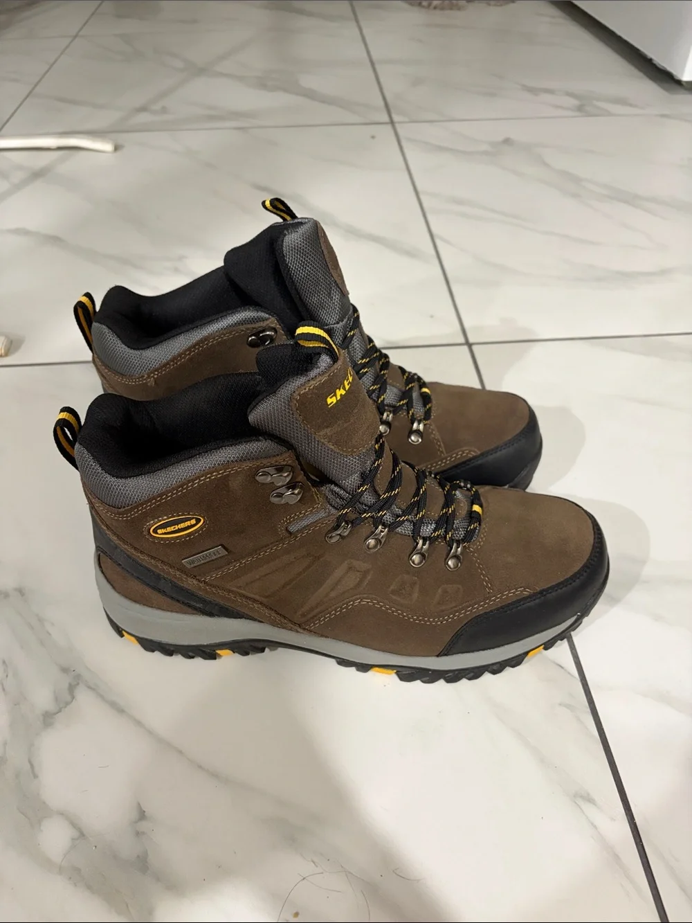 Skechers Men's Brown Trail Boots with Black and Yellow Accents